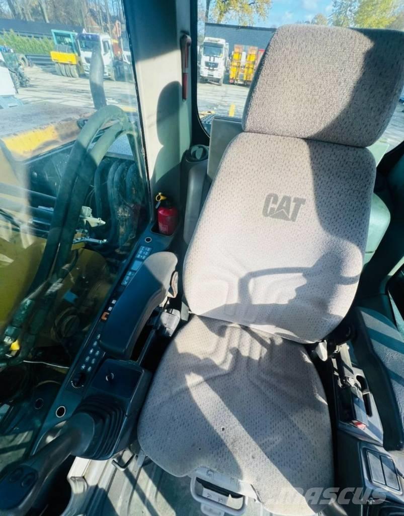 CAT M313D Колёсные экскаваторы