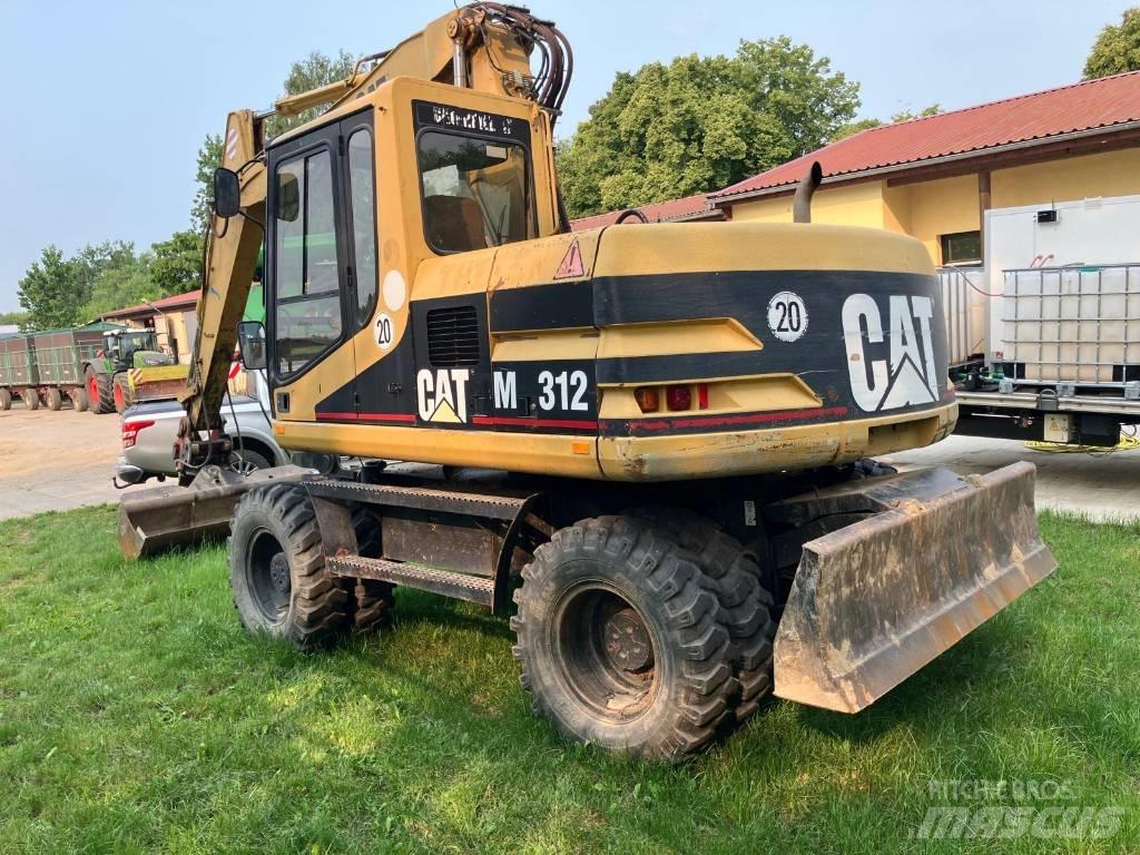CAT M 312 Колёсные экскаваторы