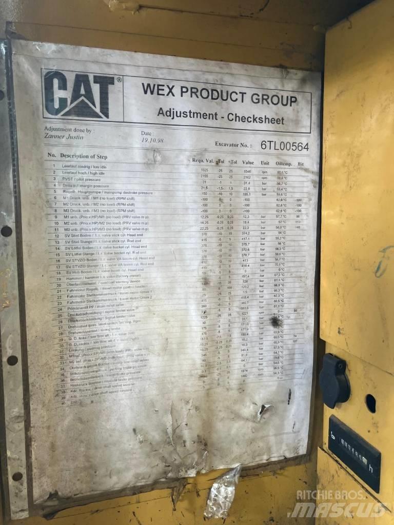CAT M 312 Колёсные экскаваторы