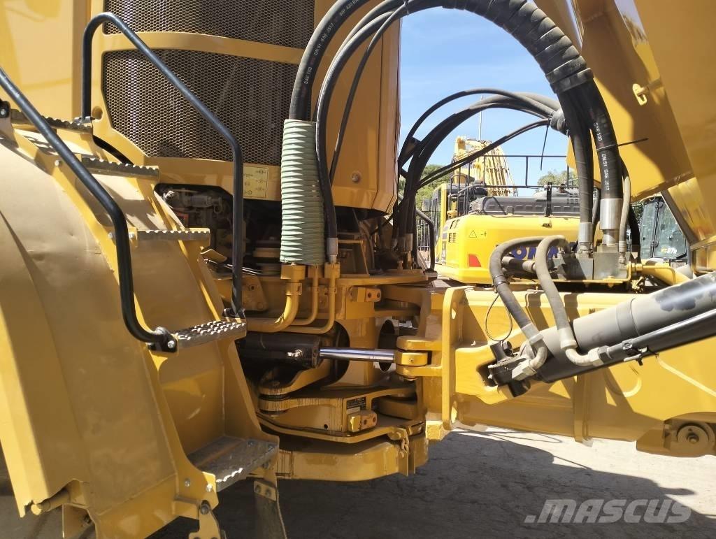 CAT 740 B Шарнирно-сочленённые самосвалы