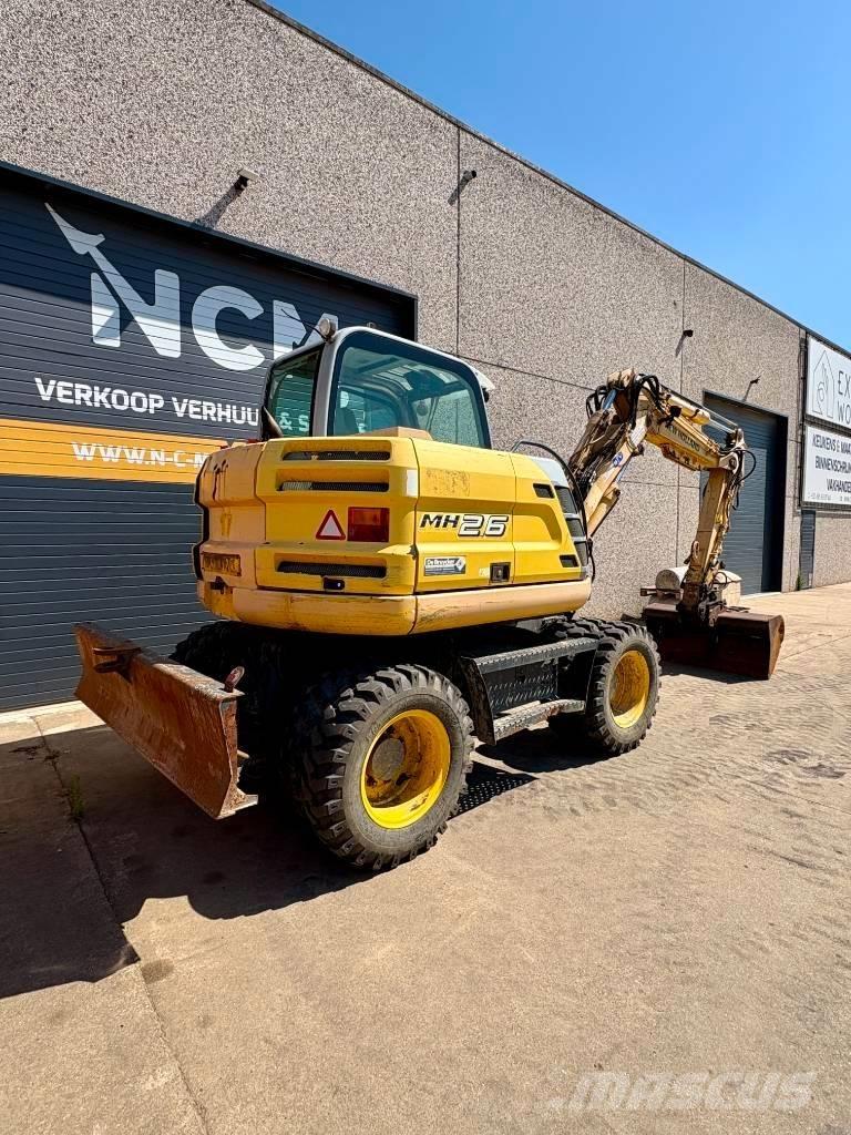 New Holland MH 2.6 Колёсные экскаваторы