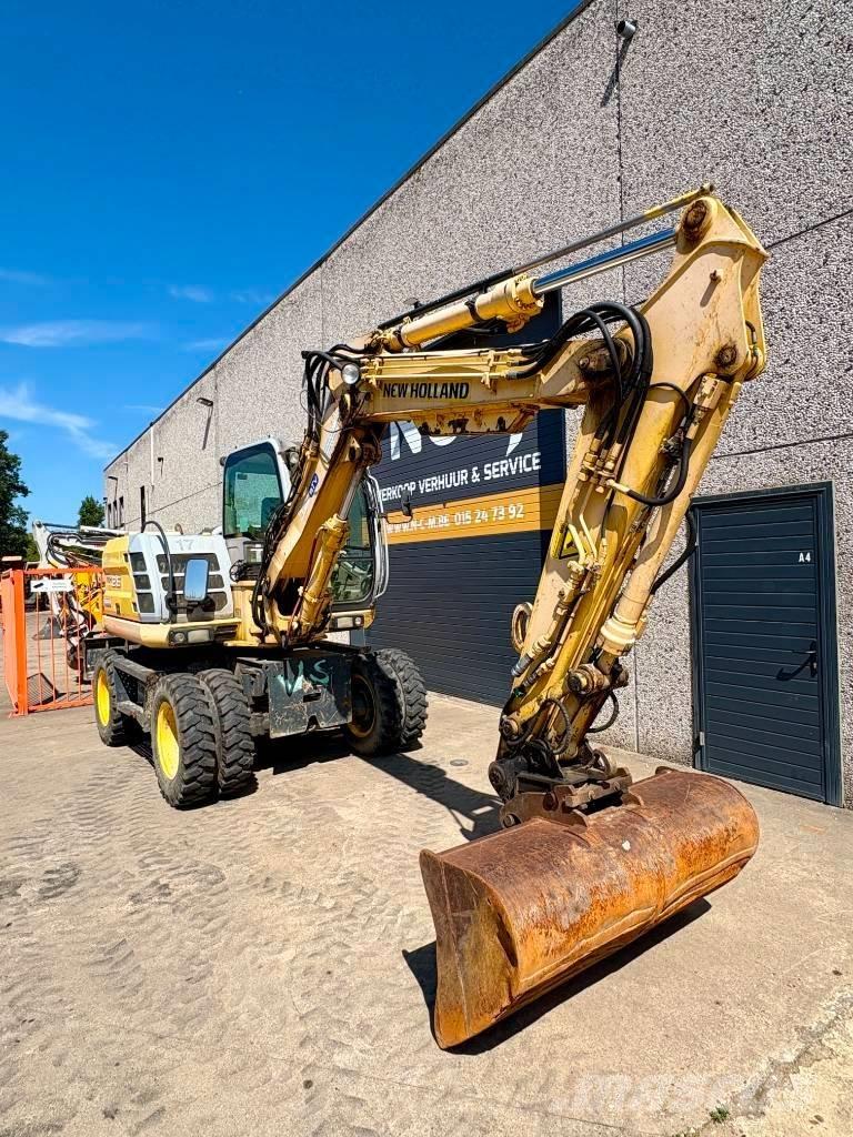 New Holland MH 2.6 Колёсные экскаваторы