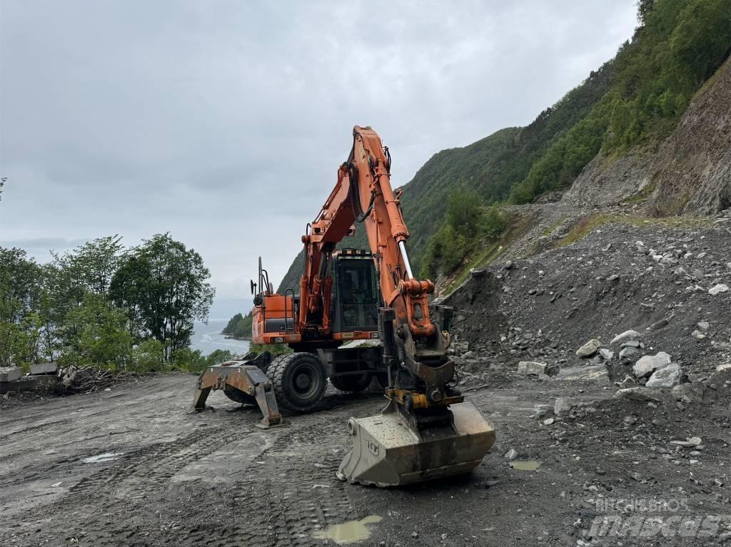 Doosan 140 W Колёсные экскаваторы