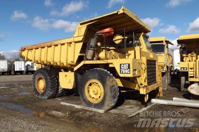 CAT 769 C Шарнирно-сочленённые самосвалы