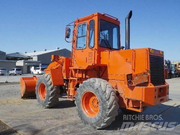 Hitachi LX70 Фронтальные погрузчики