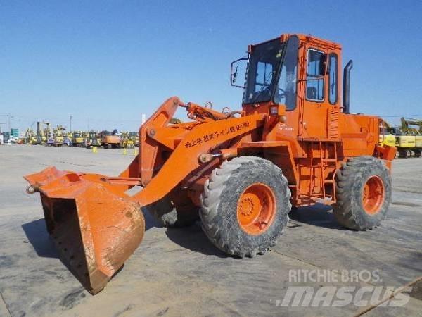 Hitachi LX70 Фронтальные погрузчики