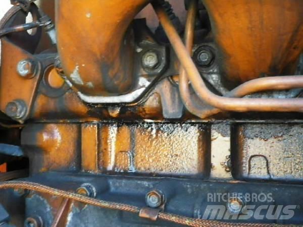 Hitachi LX70 Фронтальные погрузчики