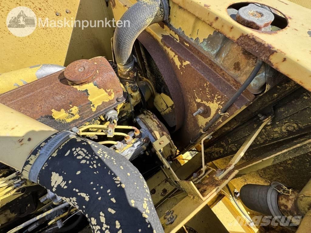 New Holland 1530 Зерноуборочные комбайны