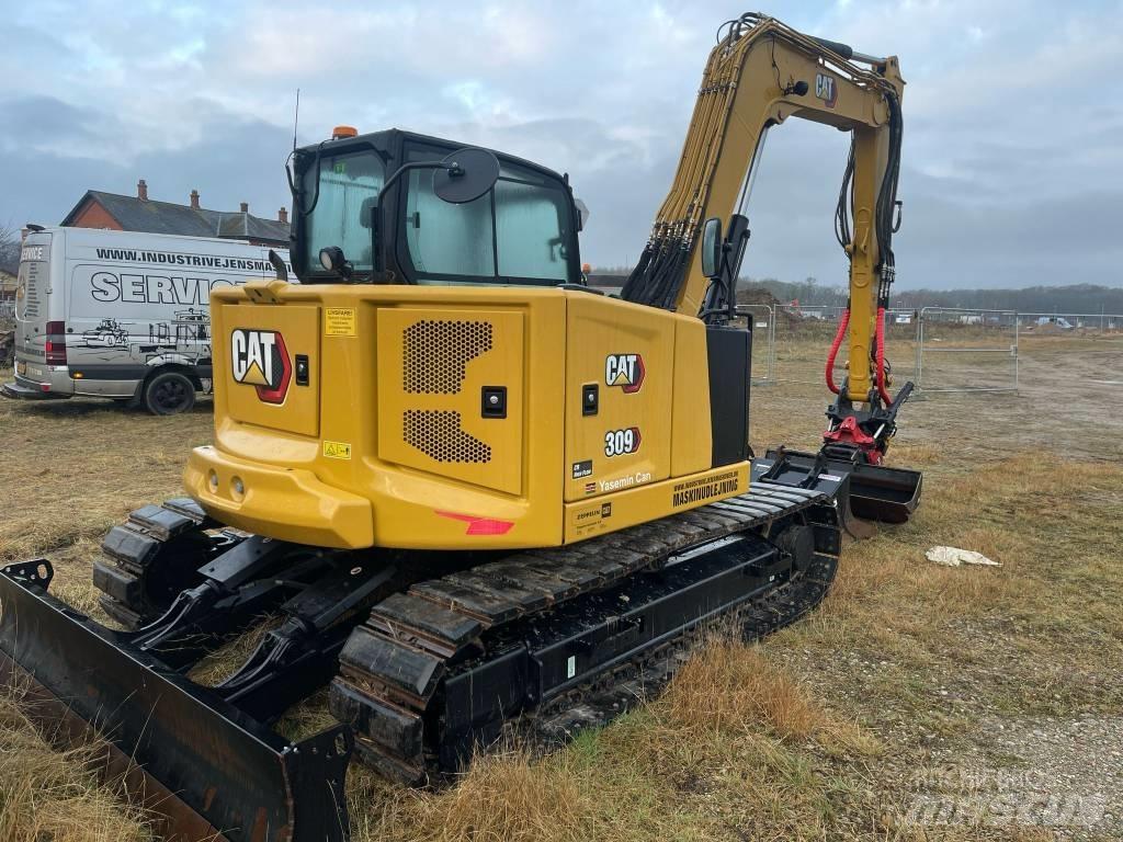 CAT 309 Малые экскаваторы 7т-12т