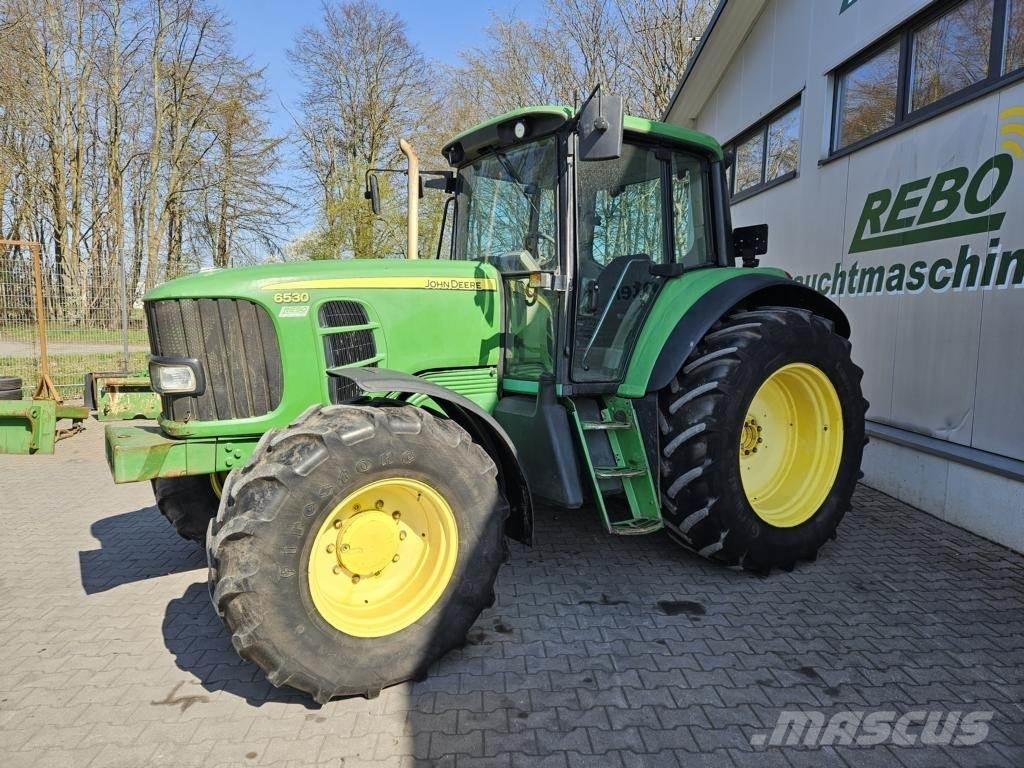 John Deere 6530 Трактора