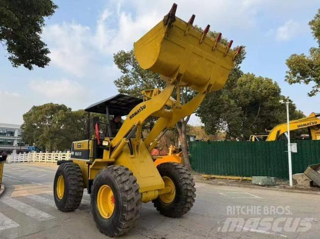 Komatsu WA 100 Фронтальные погрузчики