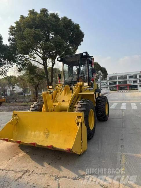 Komatsu WA 100 Фронтальные погрузчики