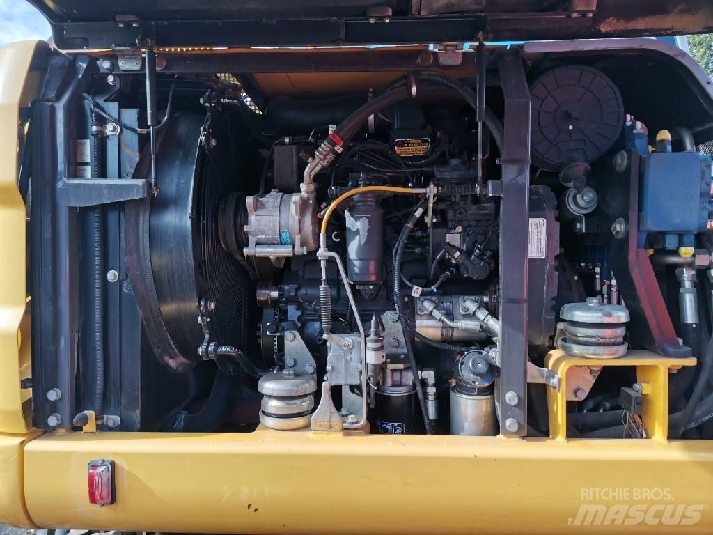 New Holland MH 2.6 Колёсные экскаваторы