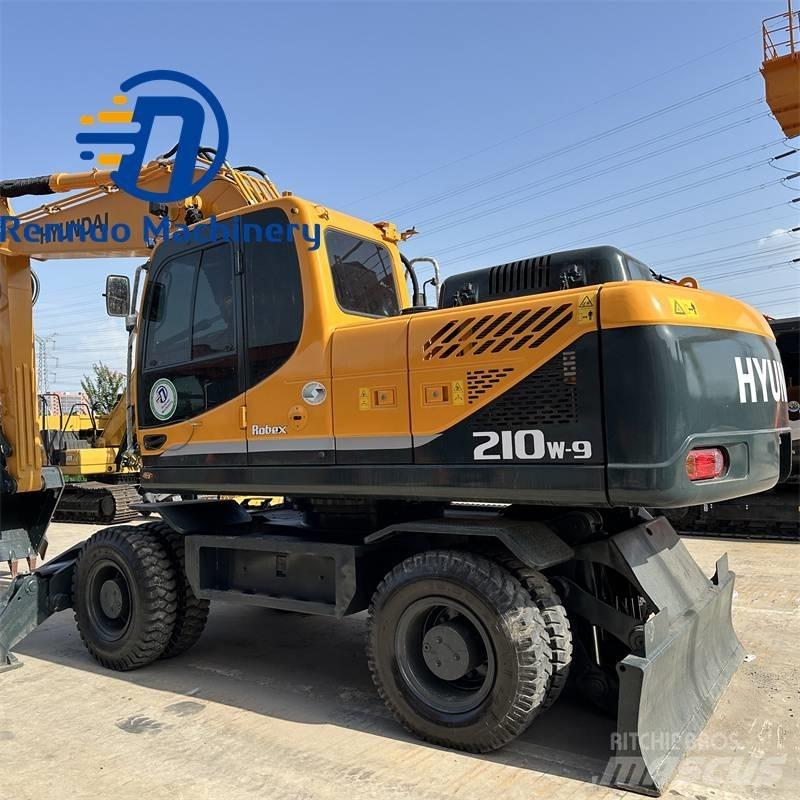 Hyundai 210W-9 Колёсные экскаваторы
