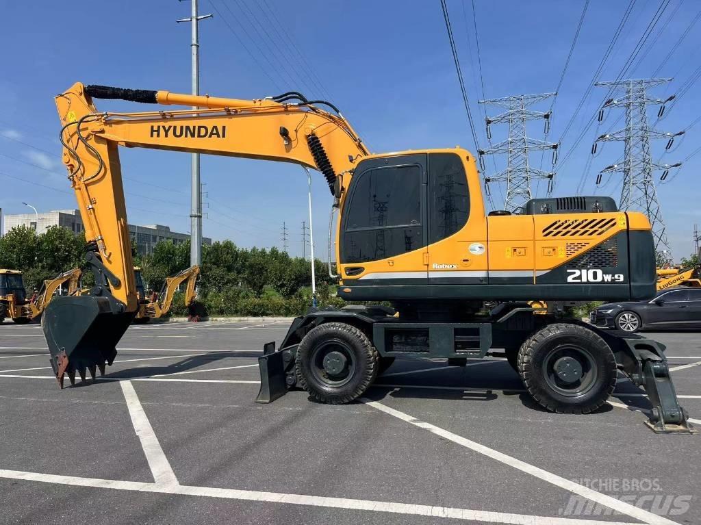 Hyundai 210W-9 Колёсные экскаваторы