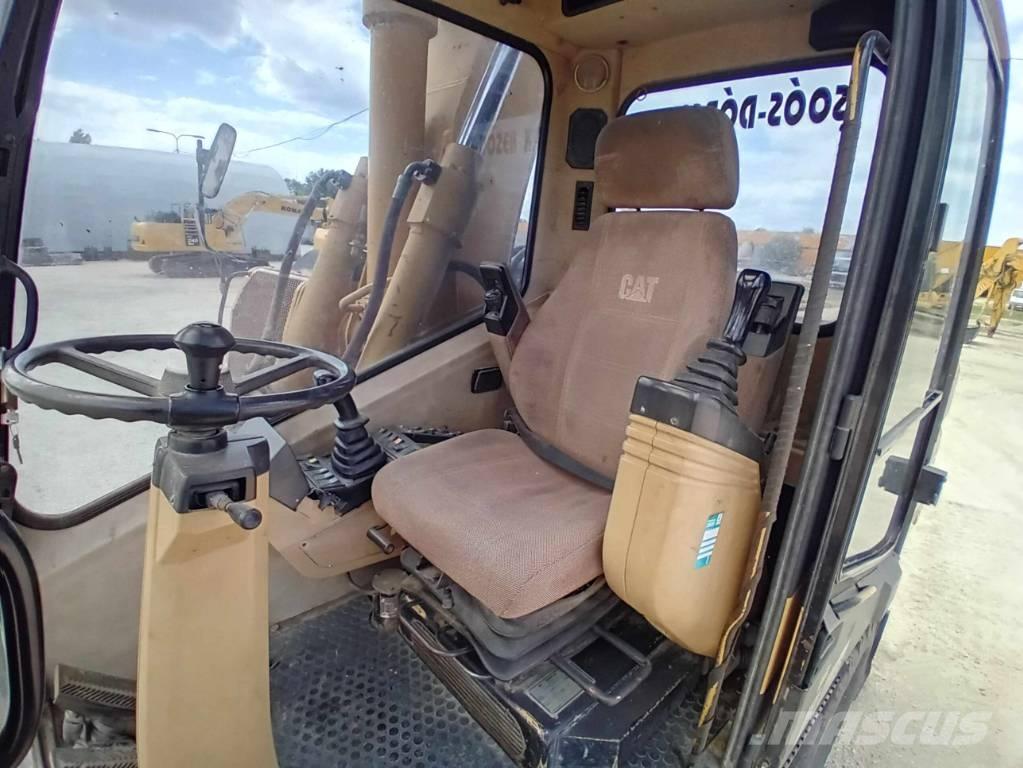 CAT M 315 Колёсные экскаваторы