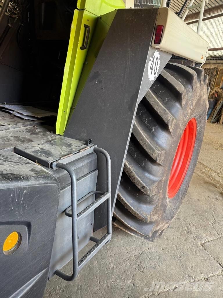 CLAAS Jaguar 900 Самоходные кормоуборочные комбайны