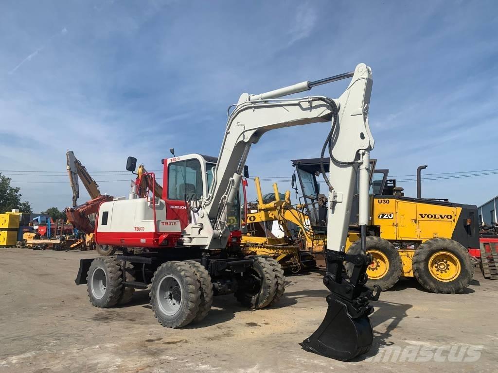 Takeuchi TB070W Колёсные экскаваторы