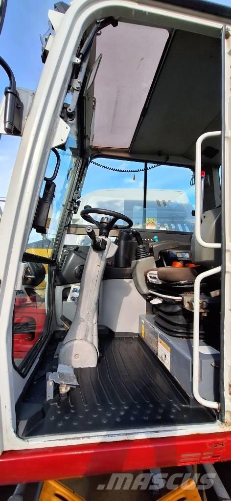 Takeuchi TB 295 W Колёсные экскаваторы