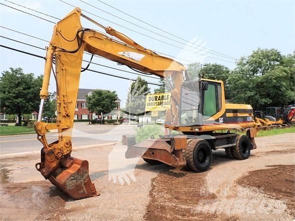 CAT M320 Колёсные экскаваторы