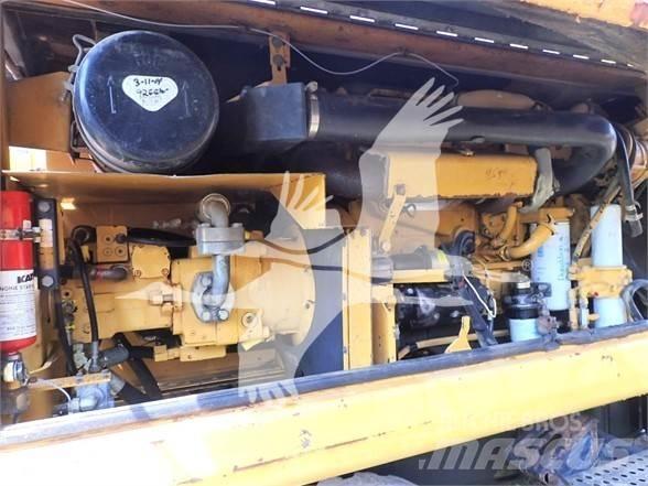 CAT M320 Колёсные экскаваторы