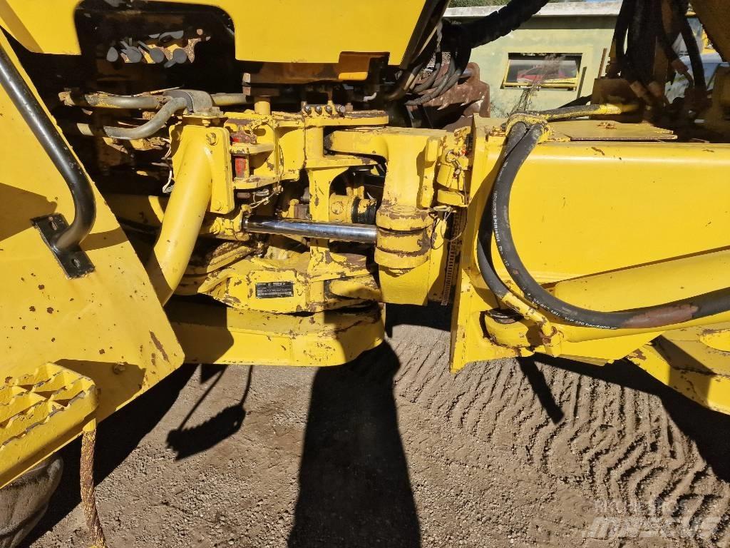 CAT 725 Шарнирно-сочленённые самосвалы