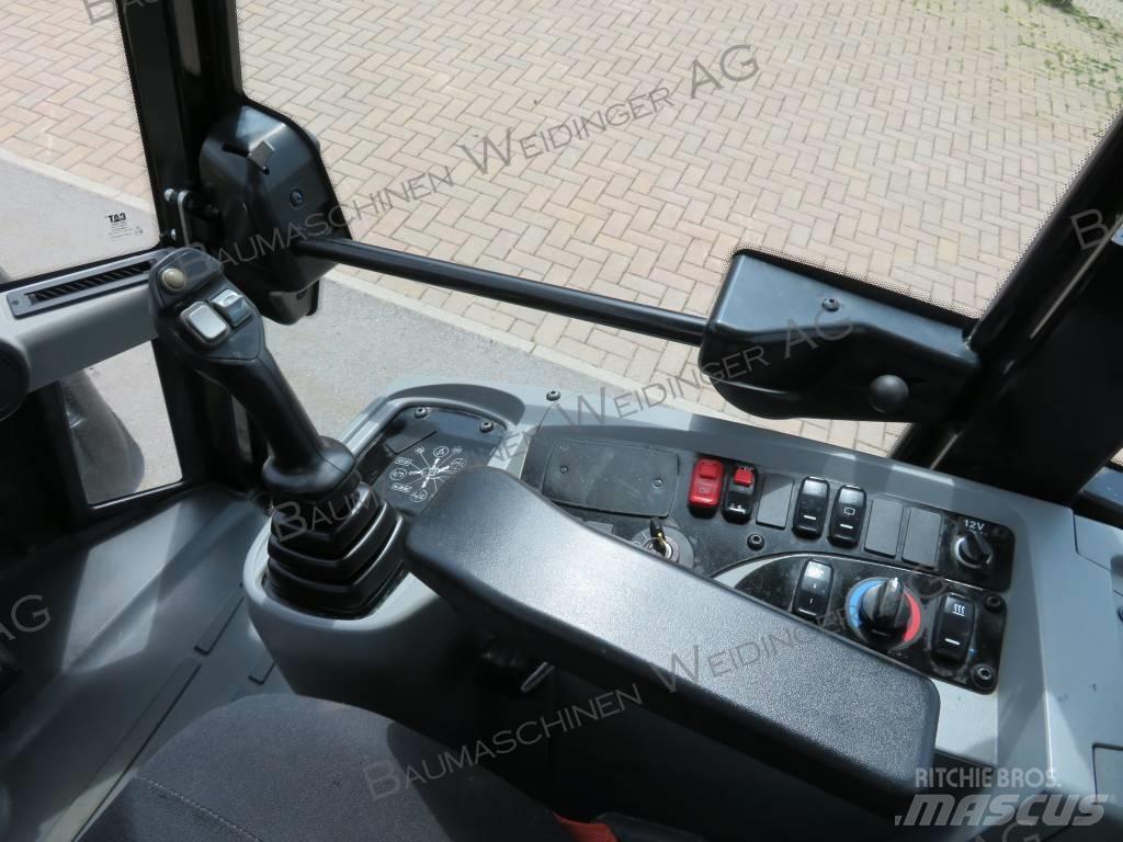 CAT 906M Фронтальные погрузчики