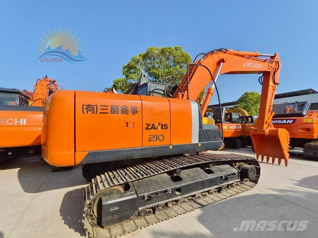 Hitachi ZX 210 Гусеничные экскаваторы