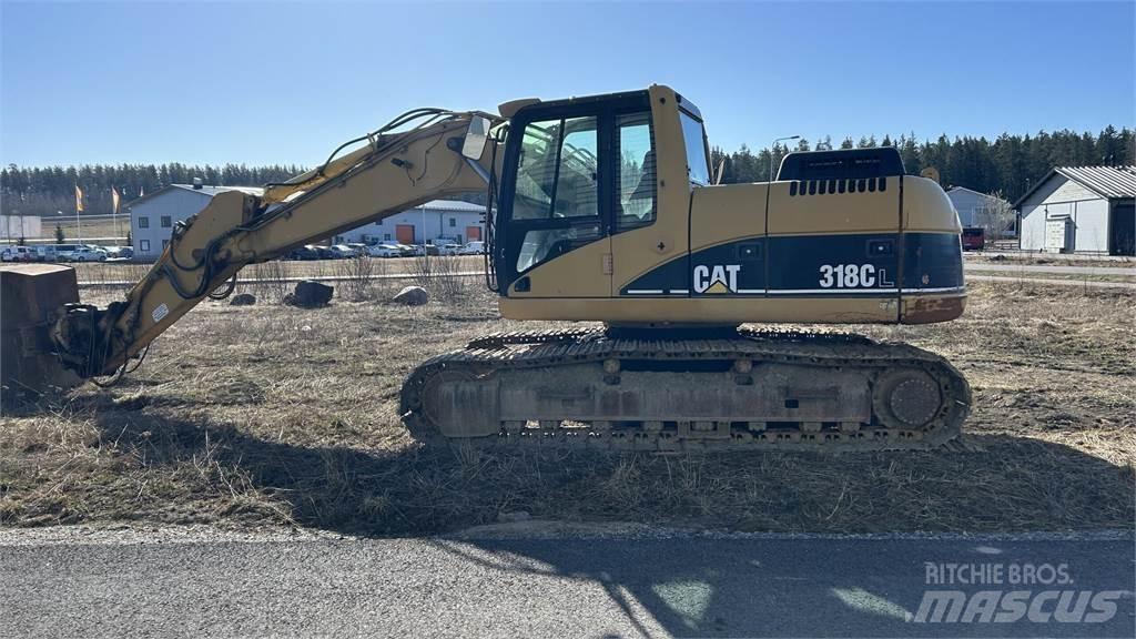 CAT 318 C Гусеничные экскаваторы