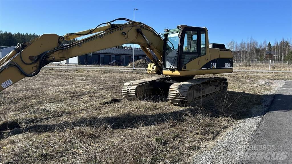 CAT 318 C Гусеничные экскаваторы