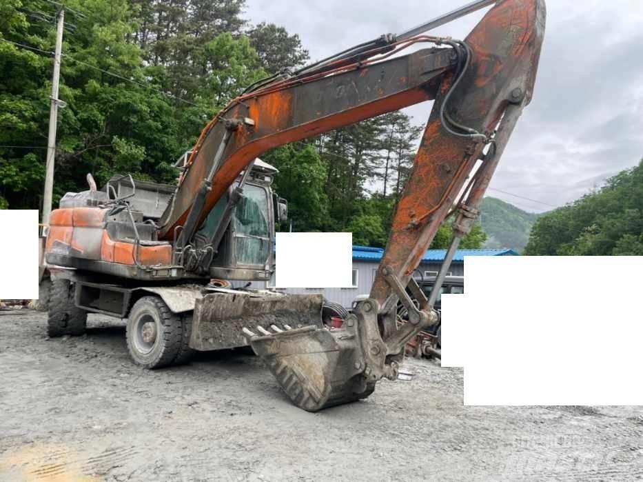 Doosan DX 210 W Колёсные экскаваторы