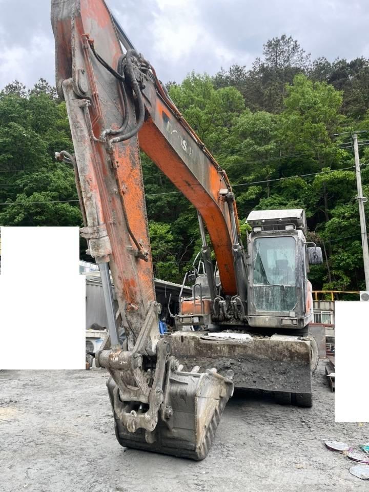 Doosan DX 210 W Колёсные экскаваторы