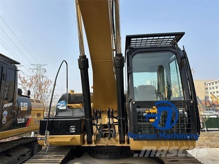 CAT 323D/323/323DL Гусеничные экскаваторы
