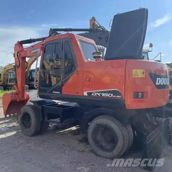 Doosan DX150W Колёсные экскаваторы