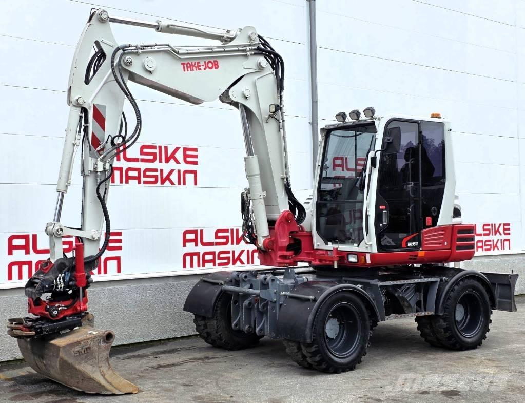 Takeuchi TB 295 W Колёсные экскаваторы