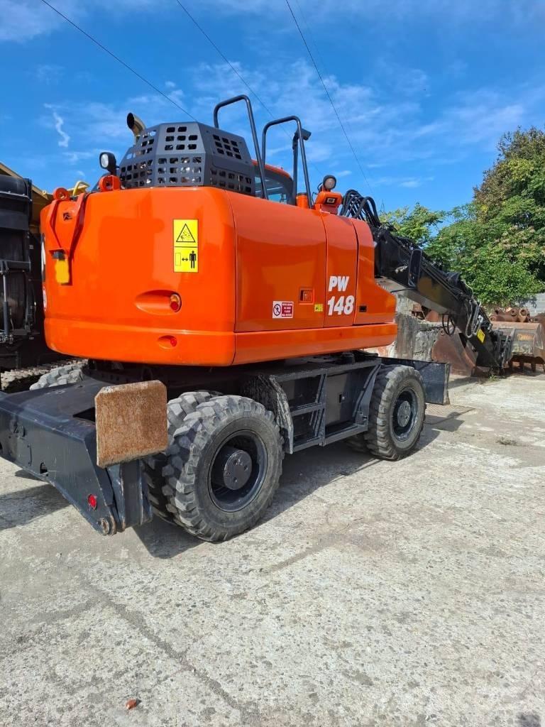 Komatsu PW 148-11 Колёсные экскаваторы