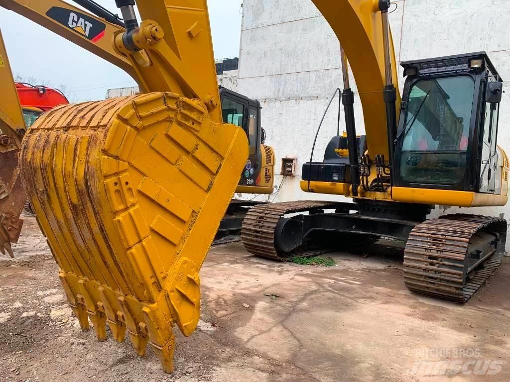 CAT 323 D L Гусеничные экскаваторы