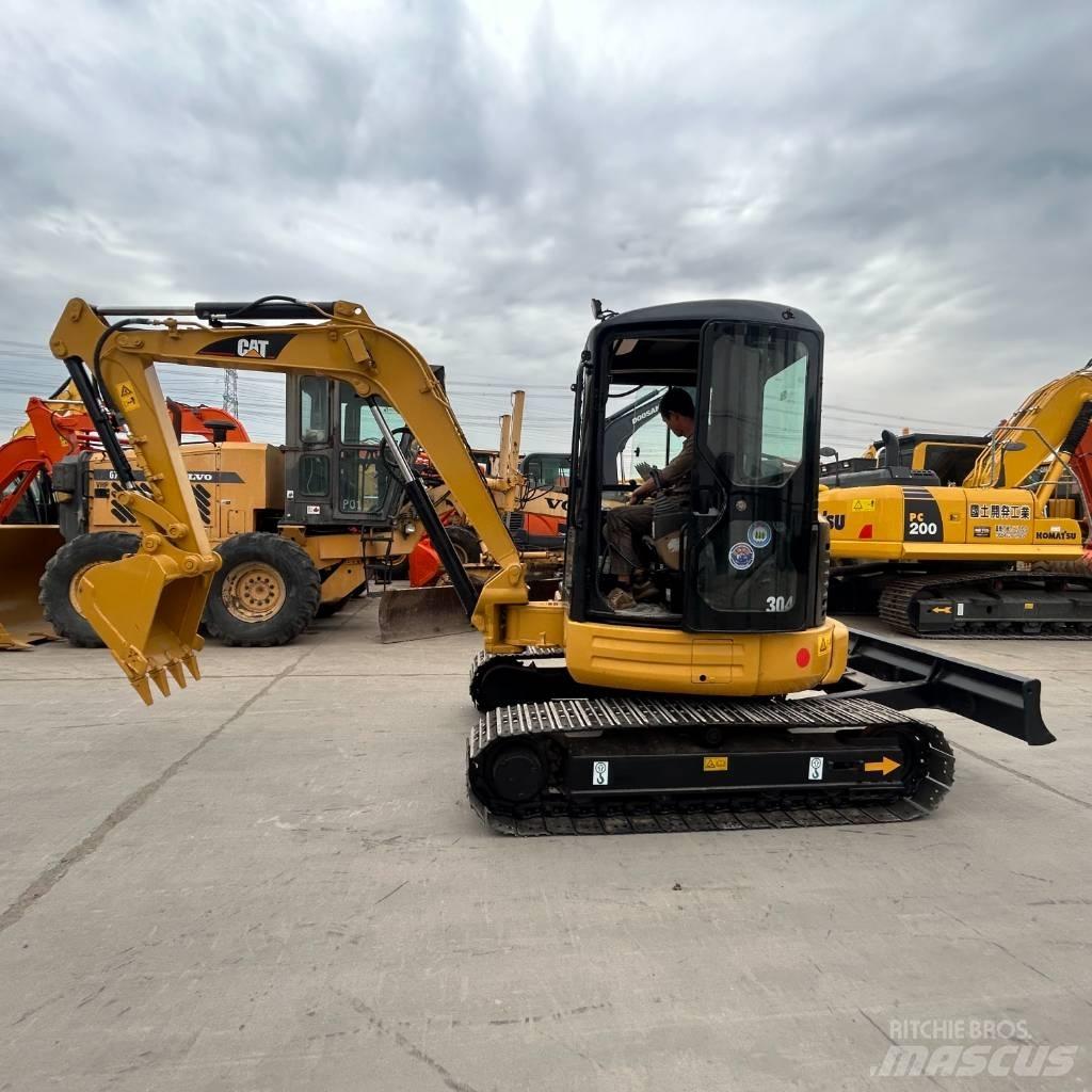 CAT 304 Гусеничные экскаваторы