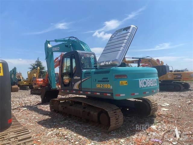 Kobelco SK210D Гусеничные экскаваторы