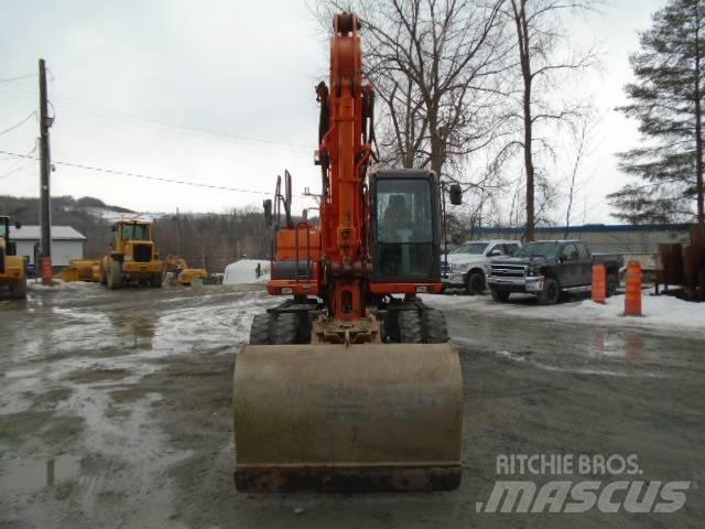 Doosan DX 140 W-3 Колёсные экскаваторы