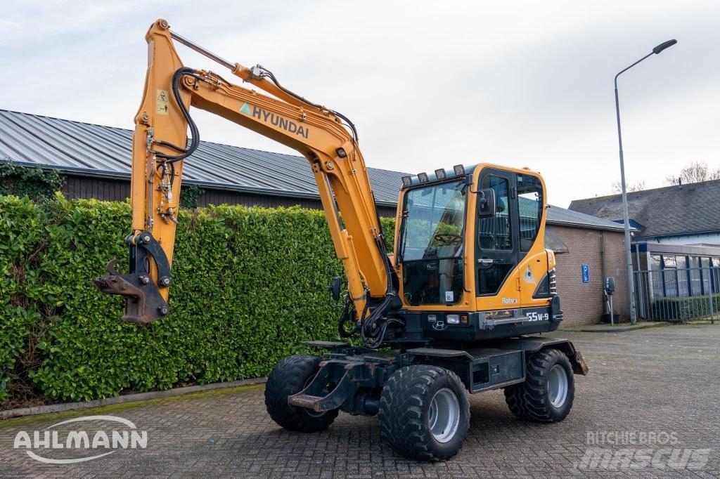 Hyundai R55W-9A Колёсные экскаваторы