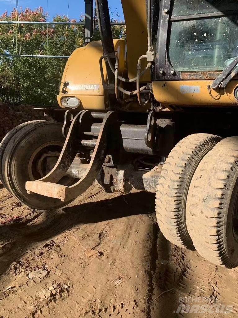 CAT 315 D Колёсные экскаваторы