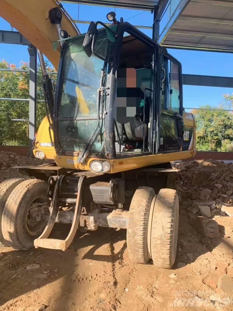 CAT 315 D Колёсные экскаваторы