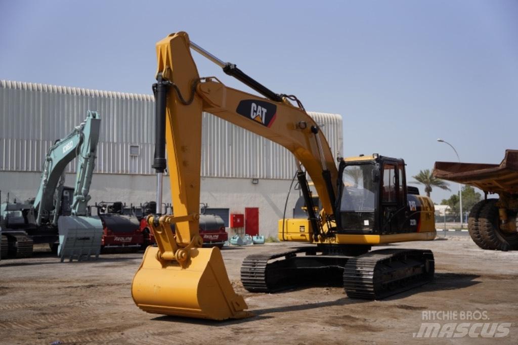 CAT 323D3 Колёсные экскаваторы