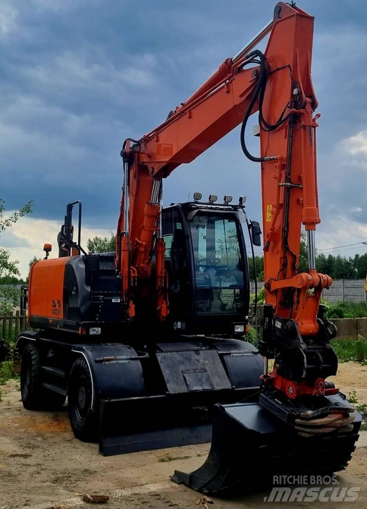 Hitachi 140W Колёсные экскаваторы