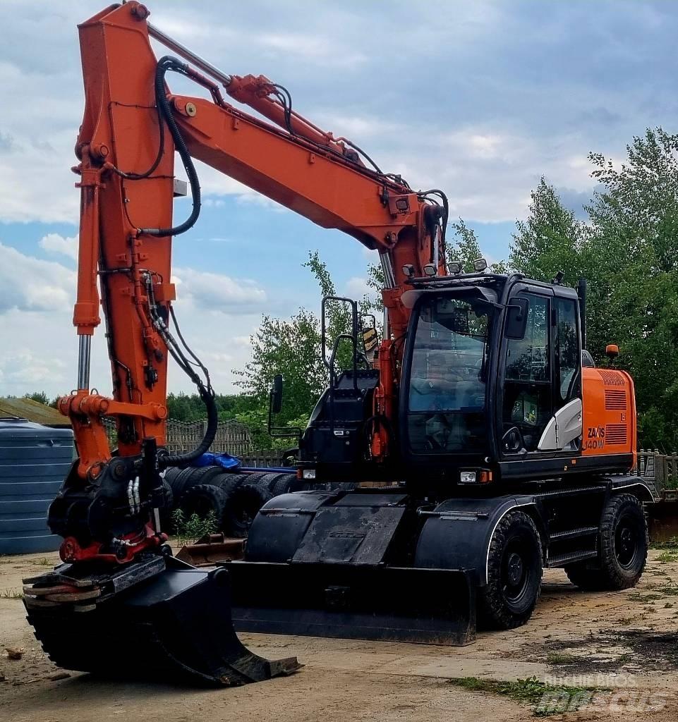 Hitachi 140W Колёсные экскаваторы