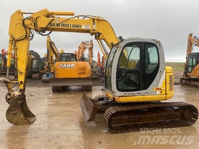 New Holland E 70 SR Малые экскаваторы 7т-12т