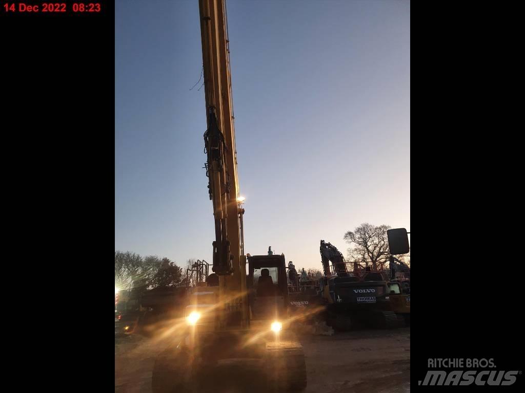 Komatsu PC210LC Экскаваторы с большим вылетом