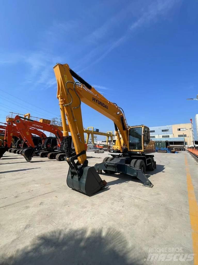 Hyundai 210W-9 Колёсные экскаваторы