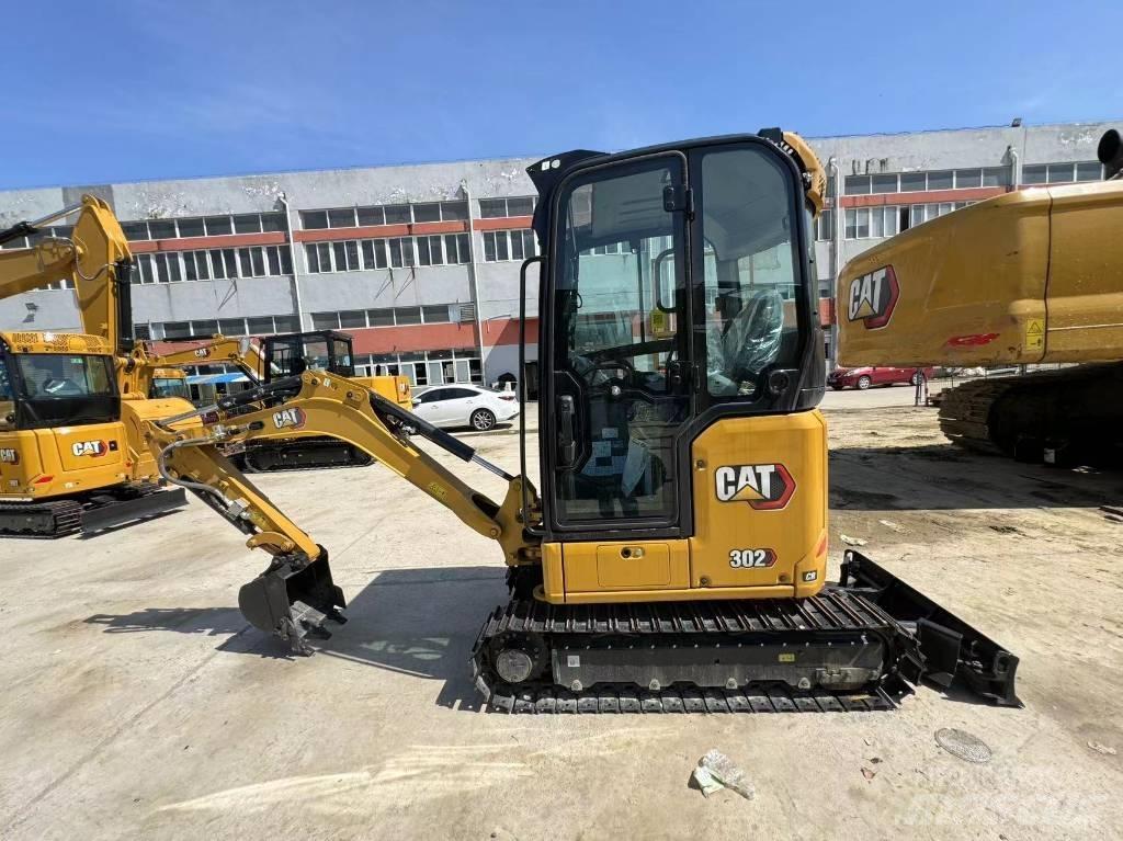 CAT 302 Мини-экскаваторы